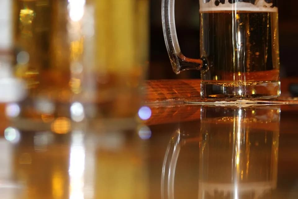 Cold beer served on a bar counter